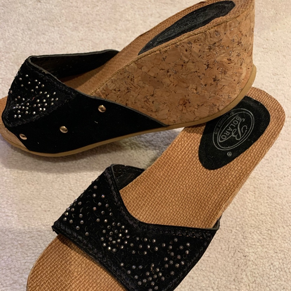 Bolero black with silver studs cork slides. Size 8